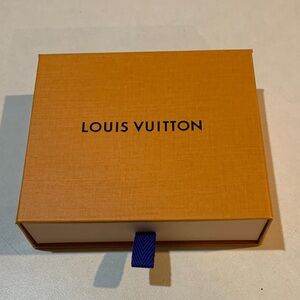 Louis Vuitton Saffron Box with Indigo Tab